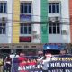 Aksi Jurnalis Papua Peringati Setahun Teror Molotov di Kantor Media di Papua