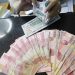 Rupiah Hari Ini Tertekan terhadap Dolar AS karena Tarif Impor Trump