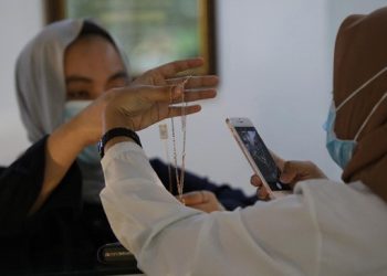 OJK Izinkan Dua Perusahaan Gadai Kembangkan Usaha Secara Nasional