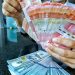 Rupiah Capai 18.184 per Dolar AS, Apakah Pemegang Valas Akan Tukar?
